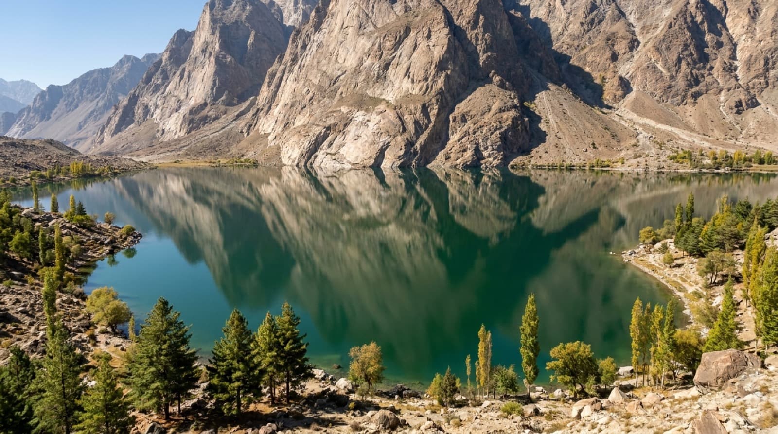 Upper Kachura lake near Skardu, still water reflecting the Karakoram peaks