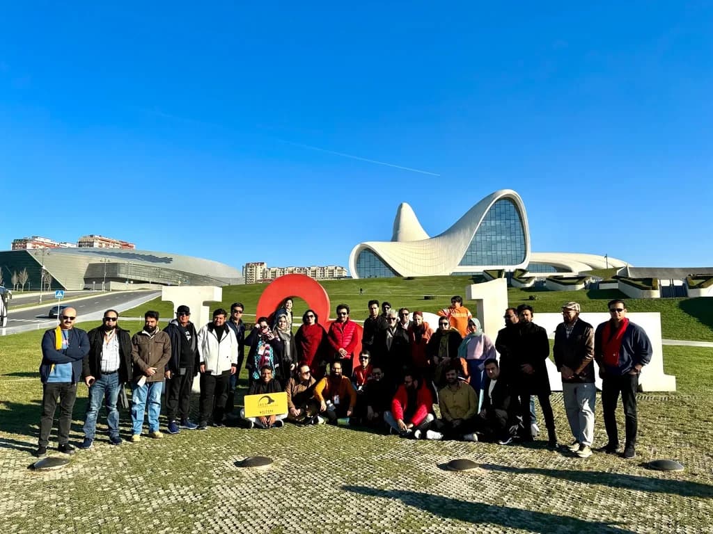 An IBEX group photographed at the Heydar Aliyev Center in Baku