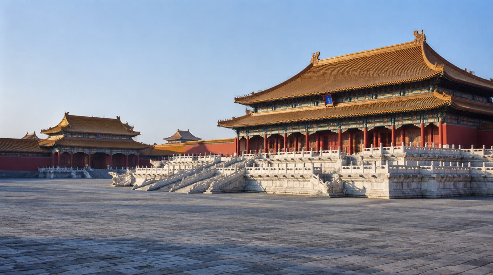 A great hall of the Forbidden City in Beijing on its white marble terraces, red walls and golden roofs